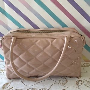 Quilted pink handbag